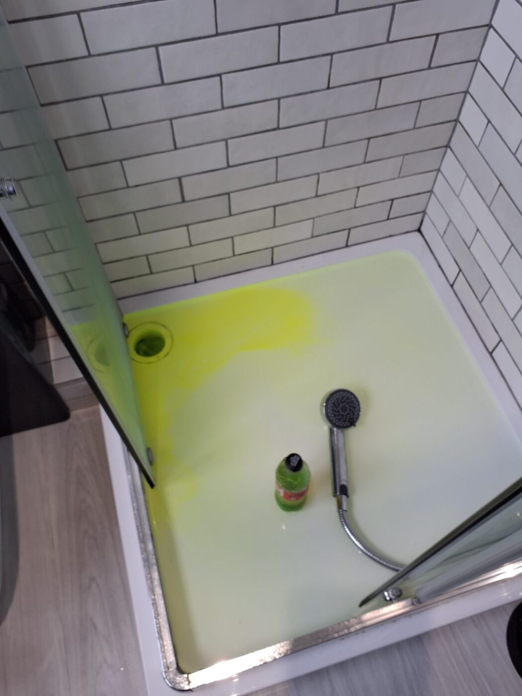 Tracer dye test on shower tray
